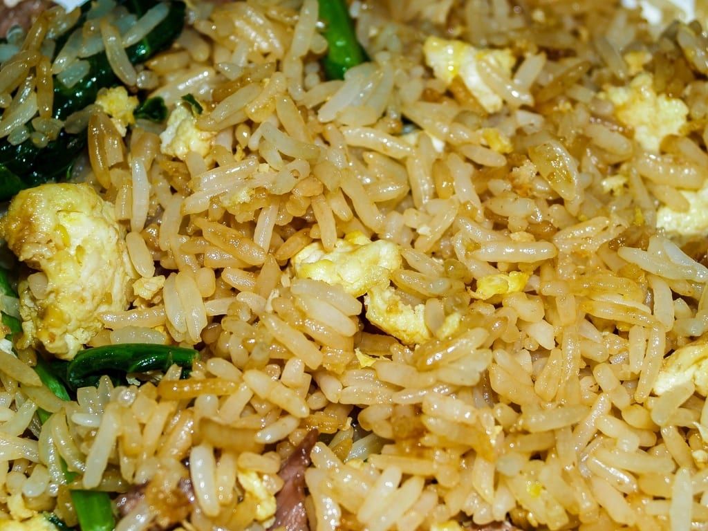 Close-up of fried rice with egg and scallions